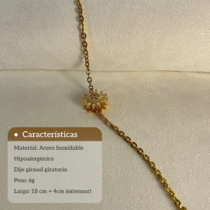 Características Pulsera Girasol Antiestrés Infografía con las características de la pulsera: material acero inoxidable, hipoalergénico, dije girasol, peso 6g y largo 18cm + 4cm.